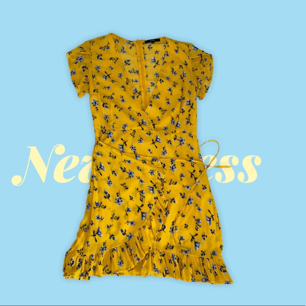 Yellow dress with blue flowers. New without tags